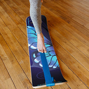 Person standing on Butterfly SlackBoard on a wooden floor