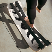 Person using a Moon Slackboard Plus on a concrete surface